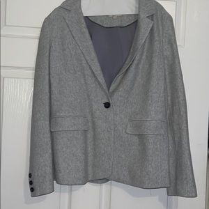 Stylish suit jacket with suede patch on the elbows